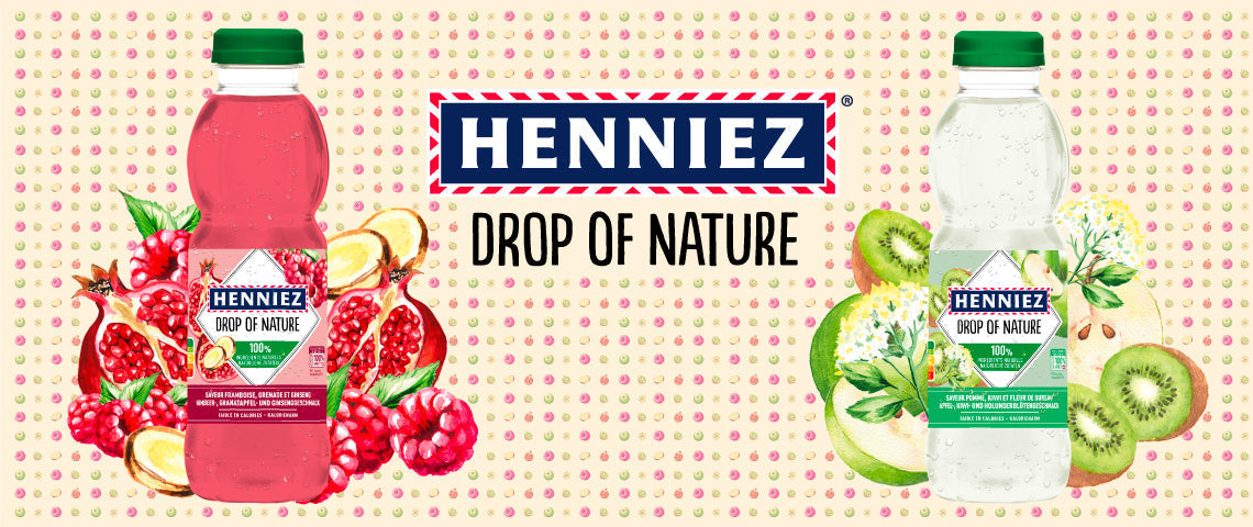 DE: Henniez Drop of Nature Banner mit Früchten und Kräutern auf rosa Hintergrund FR: Bannière Henniez Drop of Nature avec fruits et herbes sur fond rose IT: Banner Henniez Drop of Nature con frutta ed erbe su sfondo rosa EN: Henniez Drop of Nature banner with fruits and herbs on pink background